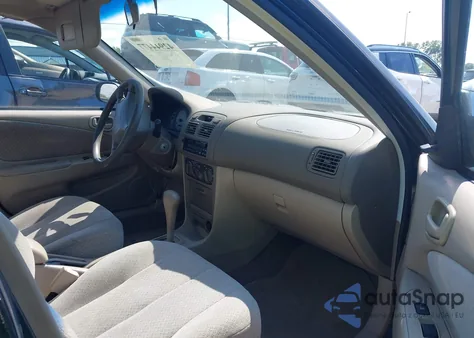 1999 Toyota Corolla Ce из США, поврежденный, VIN 2T1BR12E1XC119351